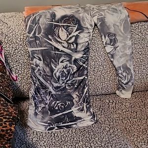 Womans dress,w rauched sides and lower sleeve size M